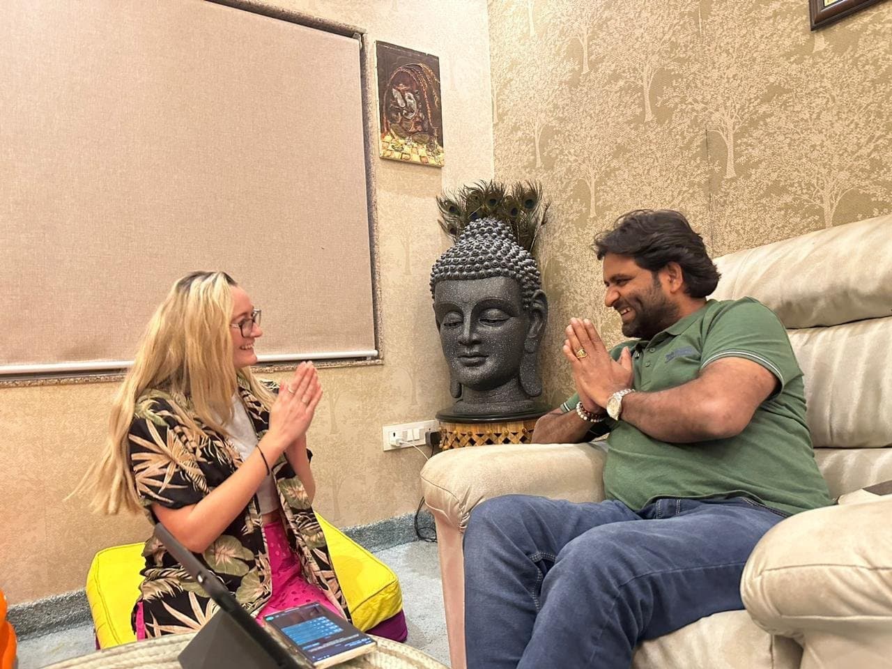 A visitor with joined palms in conversation with Dr. D.P. Shukla