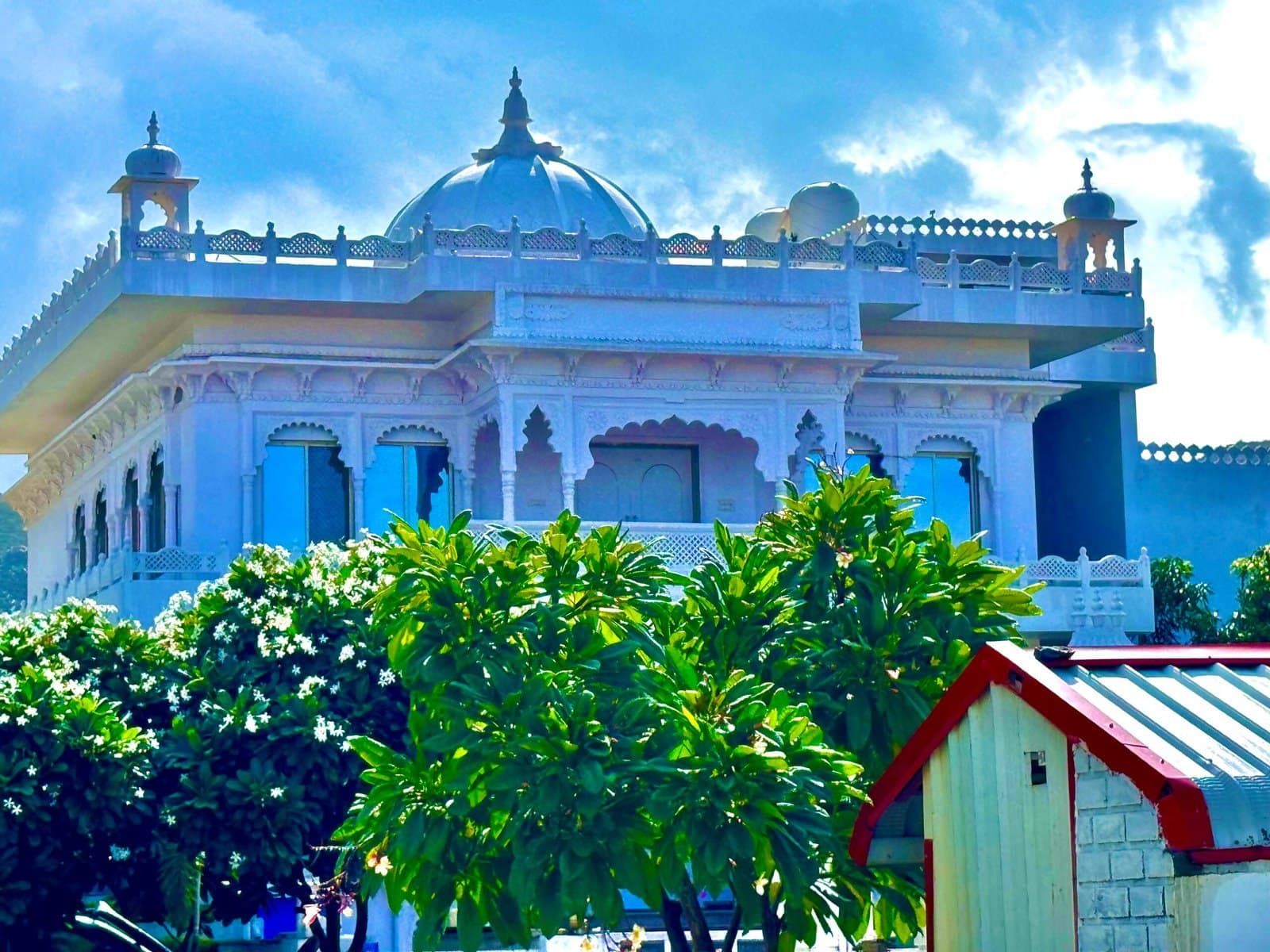 The white domed pavilion against a blue sky