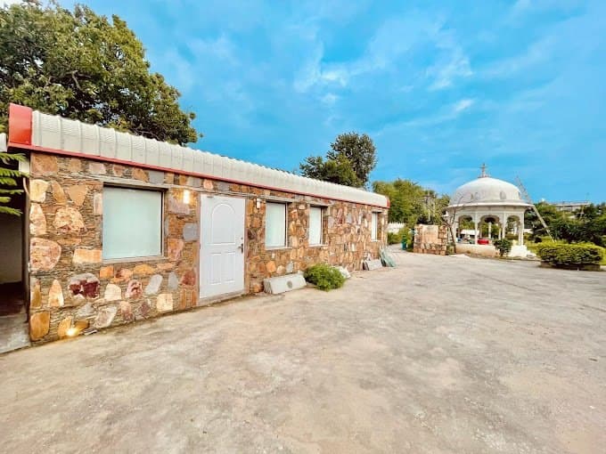 Stone-clad cottages along a courtyard