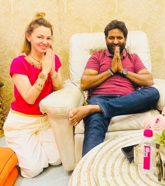 A visitor and Dr. D.P. Shukla with joined palms